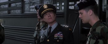 Movie still from “The Last Castle” (2001), directed by Rod Lurie – A man in a military uniform stands next to another man in a uniform; Close Up shot, Low angle