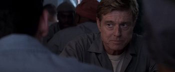 Movie still from “The Last Castle” (2001), directed by Rod Lurie – A person sitting on a bus; Close Up shot, Over the shoulder angle