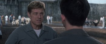 Movie still from “The Last Castle” (2001), directed by Rod Lurie – Two men are talking to each other outside; Close Up shot, Over the shoulder angle