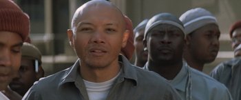 Movie still from “The Last Castle” (2001), directed by Rod Lurie – A man with a shaved head and a beard; Close Up shot, Low angle