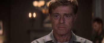 Movie still from “The Last Castle” (2001), directed by Rod Lurie – A person wearing a white shirt; Close Up shot, Low angle