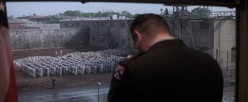 Movie still from “The Last Castle” (2001), directed by Rod Lurie – A large group of people in uniform; Extreme Wide shot, High angle