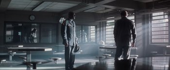 Movie still from “The Last Castle” (2001), directed by Rod Lurie – A man in a military uniform standing in a room; Wide shot, Low angle