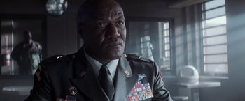 Movie still from “The Last Castle” (2001), directed by Rod Lurie – A person wearing a military uniform; Close Up shot, Low angle