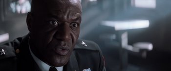Movie still from “The Last Castle” (2001), directed by Rod Lurie – A person wearing a uniform; Close Up shot, Low angle