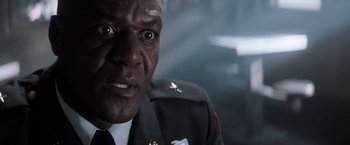 Movie still from “The Last Castle” (2001), directed by Rod Lurie – A person wearing a uniform; Close Up shot, Low angle