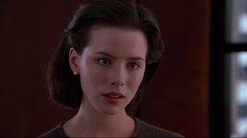 Movie still from “The Last Days of Disco” (1998), directed by Whit Stillman – A person wearing a sweater; Close Up shot, Low angle