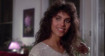 Movie still from “The Last Dragon” (1985), directed by Michael Schultz – A person wearing a white shirt; Close Up shot, Low angle