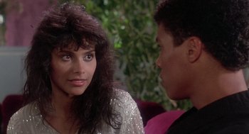 Movie still from “The Last Dragon” (1985), directed by Michael Schultz – A woman and a man talking to each other; Close Up shot, Over the shoulder angle