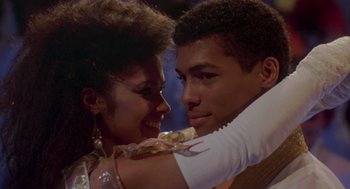 Movie still from “The Last Dragon” (1985), directed by Michael Schultz – A man and a woman are dancing together; Close Up shot, Low angle