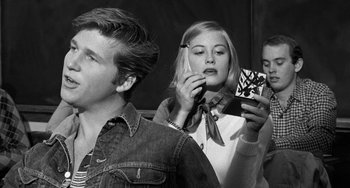 Movie still from “The Last Picture Show” (1971), directed by Peter Bogdanovich – A man and a woman looking in the same mirror; Close Up shot, Low angle