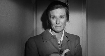 Movie still from “The Last Picture Show” (1971), directed by Peter Bogdanovich – An old black and white photo of a woman; Close Up shot, Over the shoulder angle