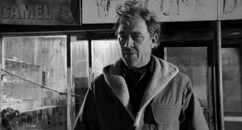 Movie still from “The Last Picture Show” (1971), directed by Peter Bogdanovich – Black and white photograph of a man in a shearling jacket; Close Up shot, Low angle