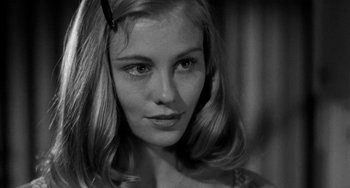 Movie still from “The Last Picture Show” (1971), directed by Peter Bogdanovich – A black and white photo of a woman's face; Close Up shot, Over the shoulder angle