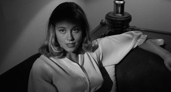 Movie still from “The Last Picture Show” (1971), directed by Peter Bogdanovich – A black - and - white photo of a woman posing for the camera; Close Up shot, Low angle