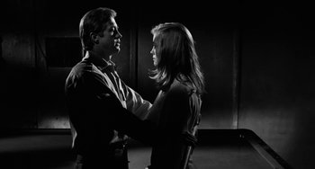 Movie still from “The Last Picture Show” (1971), directed by Peter Bogdanovich – A man and a woman are dancing in a room; Medium shot, Low angle