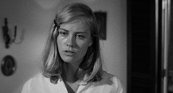 Movie still from “The Last Picture Show” (1971), directed by Peter Bogdanovich – Black and white photograph of a young woman in a white shirt; Close Up shot, Low angle