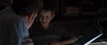 Movie still from “The Last Song” (2010), directed by Julie Anne Robinson – A young boy sitting in front of a computer screen; Close Up shot, Over the shoulder angle