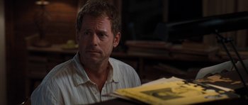 Movie still from “The Last Song” (2010), directed by Julie Anne Robinson – A person sitting at a table; Close Up shot, Over the shoulder angle