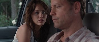 Movie still from “The Last Song” (2010), directed by Julie Anne Robinson – A man and a woman looking at one another; Close Up shot, Over the shoulder angle