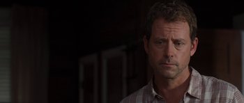 Movie still from “The Last Song” (2010), directed by Julie Anne Robinson – A person wearing a plaid shirt; Close Up shot, Over the shoulder angle