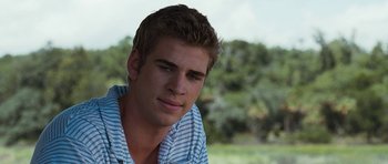 Movie still from “The Last Song” (2010), directed by Julie Anne Robinson – A person wearing a striped shirt; Close Up shot, Over the shoulder angle
