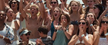 Movie still from “The Last Song” (2010), directed by Julie Anne Robinson – A group of young people standing next to each other; Medium shot, High angle