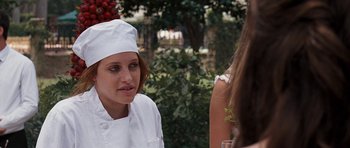 Movie still from “The Last Song” (2010), directed by Julie Anne Robinson – A woman wearing a chef's hat talking to another woman; Close Up shot, Over the shoulder angle