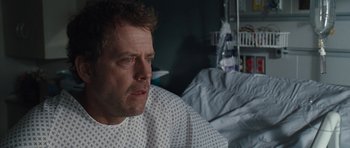 Movie still from “The Last Song” (2010), directed by Julie Anne Robinson – A person sitting in a hospital bed; Close Up shot, Over the shoulder angle
