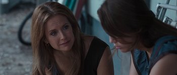 Movie still from “The Last Song” (2010), directed by Julie Anne Robinson – Two women sitting in front of each other in a room; Close Up shot, Over the shoulder angle