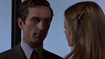 Movie still from “The Last Tycoon” (1976), directed by Elia Kazan – A man and a woman looking at one another; Close Up shot, Over the shoulder angle