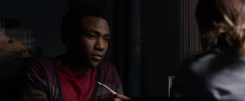Movie still from “The Lazarus Effect” (2015), directed by David Gelb – A man sitting in front of a table holding chopsticks; Close Up shot, Over the shoulder angle