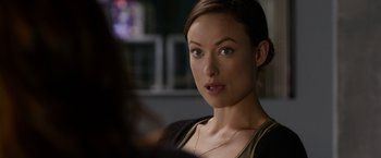 Movie still from “The Lazarus Effect” (2015), directed by David Gelb – A person wearing a necklace; Close Up shot, Over the shoulder angle