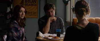 Movie still from “The Lazarus Effect” (2015), directed by David Gelb – A man sitting at a table with a plate of food in front of him; Medium shot, Over the shoulder angle