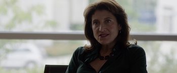 Movie still from “The Lazarus Effect” (2015), directed by David Gelb – A person sitting in front of a window; Close Up shot, Over the shoulder angle