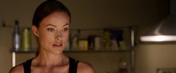 Movie still from “The Lazarus Effect” (2015), directed by David Gelb – A person wearing a tank top; Close Up shot, Over the shoulder angle