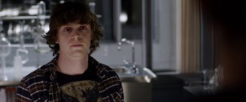 Movie still from “The Lazarus Effect” (2015), directed by David Gelb – A young man in a plaid shirt is looking at the camera; Close Up shot, Over the shoulder angle