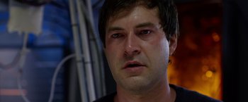 Movie still from “The Lazarus Effect” (2015), directed by David Gelb – A man's face in a black shirt; Close Up shot, Over the shoulder angle
