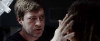 Movie still from “The Lazarus Effect” (2015), directed by David Gelb – A person talking to another person; Close Up shot, Over the shoulder angle