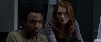 Movie still from “The Lazarus Effect” (2015), directed by David Gelb – A man and a woman sitting next to each other in a room; Close Up shot, Over the shoulder angle