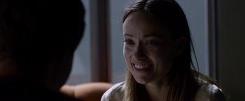 Movie still from “The Lazarus Effect” (2015), directed by David Gelb – A person smiling; Close Up shot, Over the shoulder angle