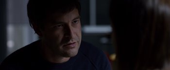 Movie still from “The Lazarus Effect” (2015), directed by David Gelb – A person sitting in front of another person; Close Up shot, Over the shoulder angle