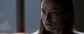 Movie still from “The Lazarus Effect” (2015), directed by David Gelb – A person looking at the camera; Close Up shot, Over the shoulder angle