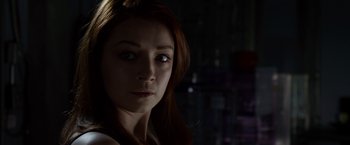 Movie still from “The Lazarus Effect” (2015), directed by David Gelb – A person with long red hair; Close Up shot, Low angle
