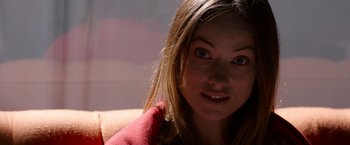 Movie still from “The Lazarus Effect” (2015), directed by David Gelb – A person holding a red towel; Close Up shot, Over the shoulder angle