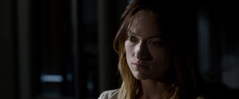 Movie still from “The Lazarus Effect” (2015), directed by David Gelb – A person with long brown hair; Close Up shot, Over the shoulder angle