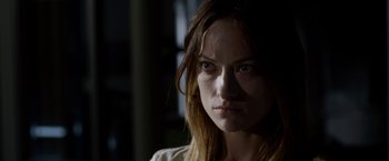 Movie still from “The Lazarus Effect” (2015), directed by David Gelb – A person wearing a white shirt; Close Up shot, Over the shoulder angle