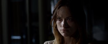 Movie still from “The Lazarus Effect” (2015), directed by David Gelb – A person wearing a white shirt; Close Up shot, Over the shoulder angle