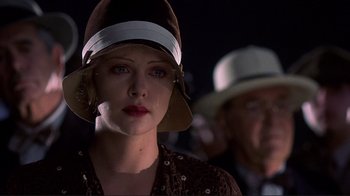 Movie still from “The Legend of Bagger Vance” (2000), directed by Robert Redford – A person wearing a hat; Close Up shot, Low angle
