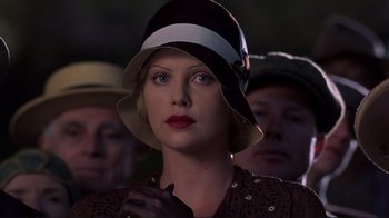 Movie still from “The Legend of Bagger Vance” (2000), directed by Robert Redford – A person wearing a hat; Close Up shot, Low angle